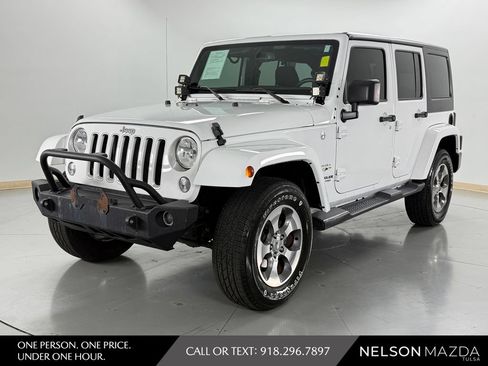 Used 2016 Jeep Wrangler Unlimited Sahara AWD/4WD image 1