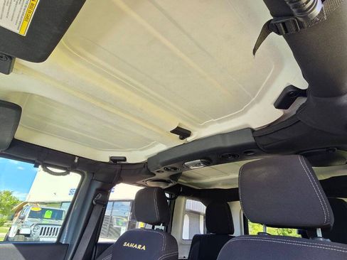 Used 2014 Jeep Wrangler Unlimited Sahara w/ Dual Top Group AWD/4WD image 26