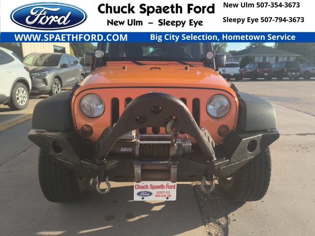 Used 2012 Jeep Wrangler Unlimited Sport w/ Black Appearance Group AWD/4WD image 1