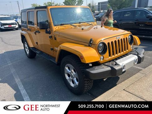 Used 2014 Jeep Wrangler Unlimited Sahara w/ Connectivity Group AWD/4WD image 1