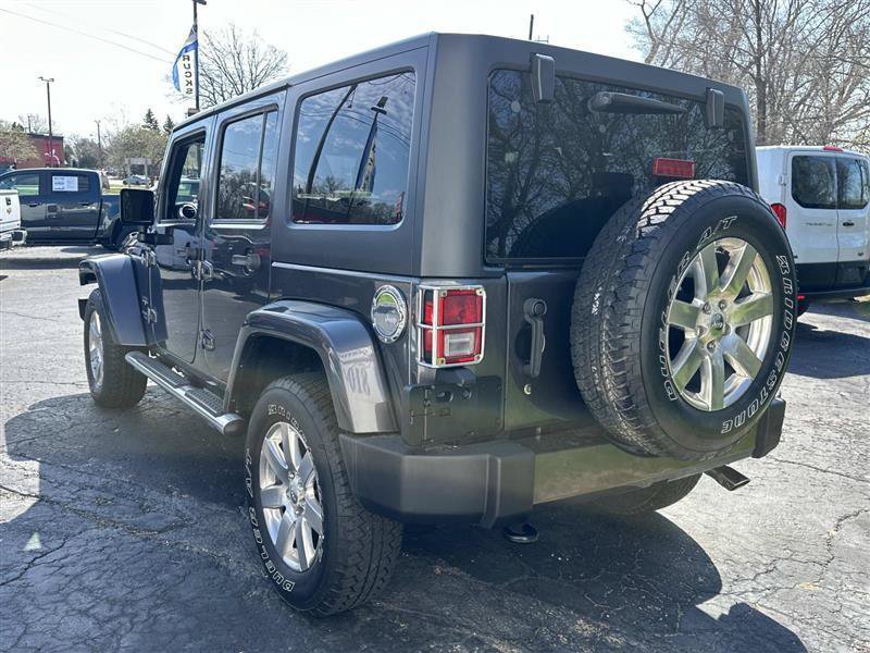 Used 2016 Jeep Wrangler Unlimited Sahara w/ Dual Top Group AWD/4WD image 4