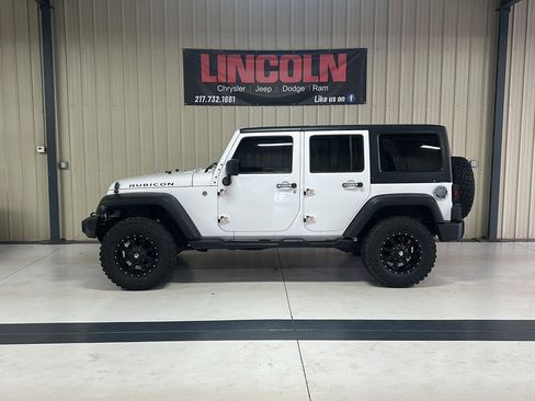 Used 2011 Jeep Wrangler Unlimited Rubicon w/ Dual Top Group AWD/4WD image 5