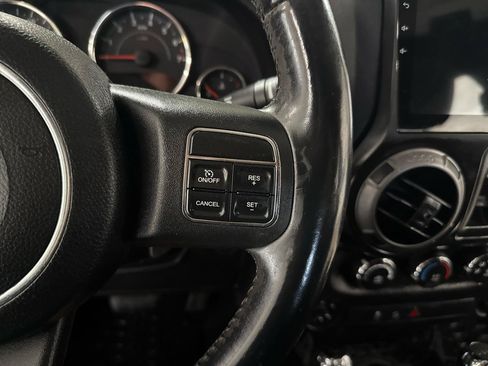 Used 2012 Jeep Wrangler Unlimited Sport AWD/4WD image 12