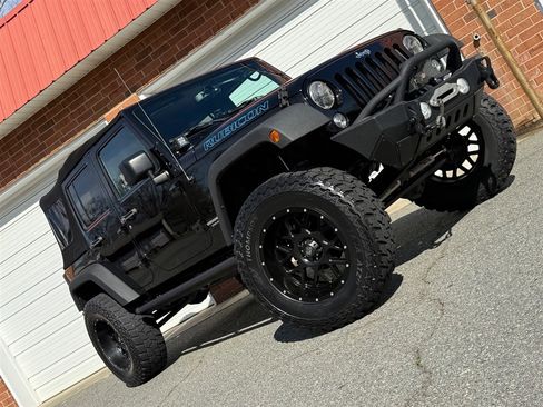 Used 2015 Jeep Wrangler Unlimited Rubicon w/ Dual Top Group AWD/4WD image 29