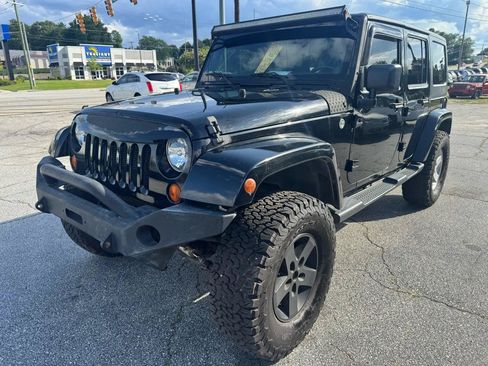 Used 2012 Jeep Wrangler Unlimited Sport AWD/4WD image 2