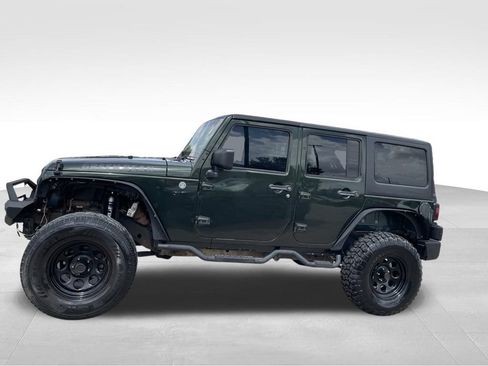 Used 2012 Jeep Wrangler Unlimited Sport AWD/4WD image 8