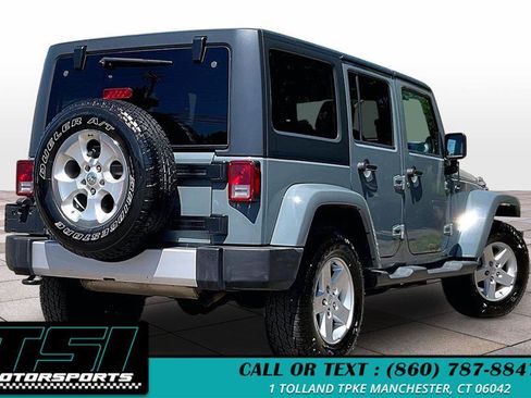 Used 2014 Jeep Wrangler Unlimited Sahara w/ Dual Top Group AWD/4WD image 2