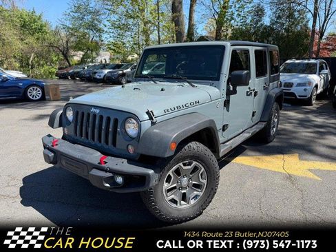 Used 2015 Jeep Wrangler Unlimited Rubicon w/ Dual Top Group AWD/4WD image 1