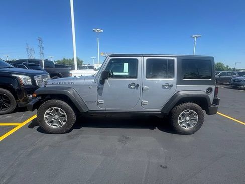 Used 2014 Jeep Wrangler Unlimited Rubicon w/ Dual Top Group AWD/4WD image 4