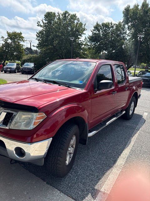 Used 2011 Nissan Frontier SV w/ SV Premium Utility Pkg AWD/4WD image 2