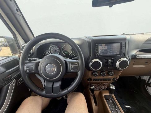 Used 2012 Jeep Wrangler Unlimited Sahara w/ Dual Top Group AWD/4WD image 15