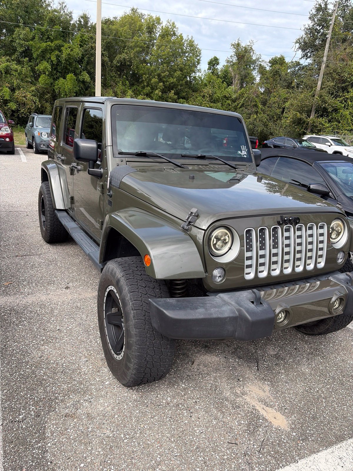 Used 2016 Jeep Wrangler Unlimited Sahara AWD/4WD image 1
