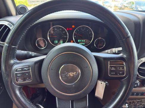 Used 2012 Jeep Wrangler Unlimited Sahara w/ Dual Top Group AWD/4WD image 9