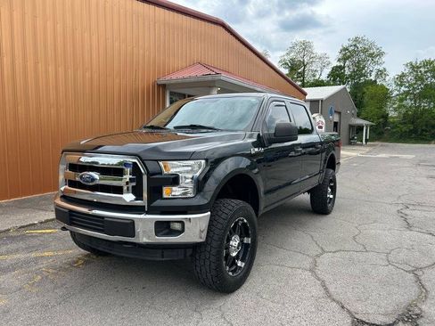 Used 2015 Ford F150 XLT AWD/4WD image 1