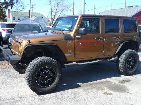 Used 2011 Jeep Wrangler Unlimited 70th Anniversary w/ Dual Top Group image 1