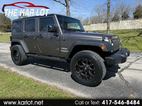 Used 2014 Jeep Wrangler Unlimited Sport w/ Quick Order Package 24S AWD/4WD image 1