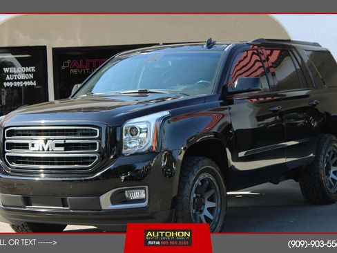Used 2019 GMC Yukon SLT w/ Graphite Performance Edition AWD/4WD image 1