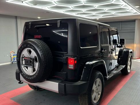 Used 2012 Jeep Wrangler Unlimited Sahara w/ Dual Top Group image 7