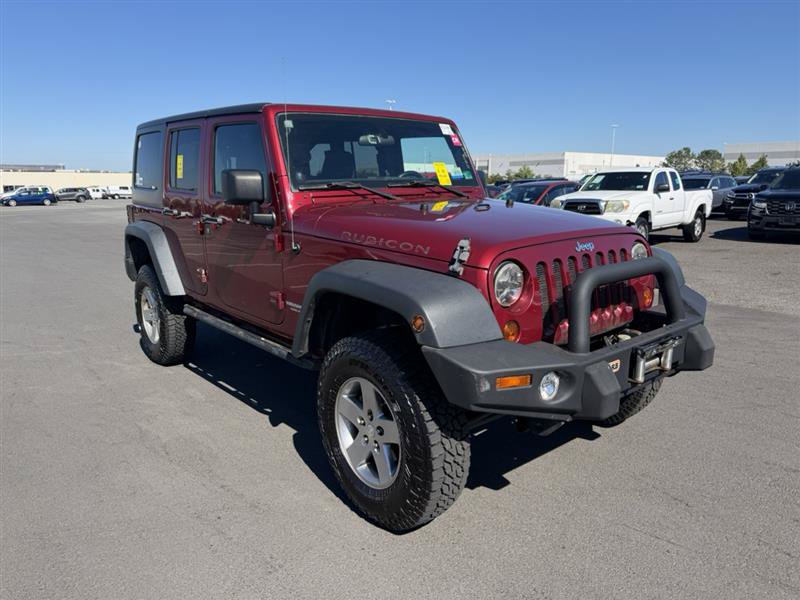 Used 2012 Jeep Wrangler Unlimited Rubicon w/ Dual Top Group AWD/4WD image 6