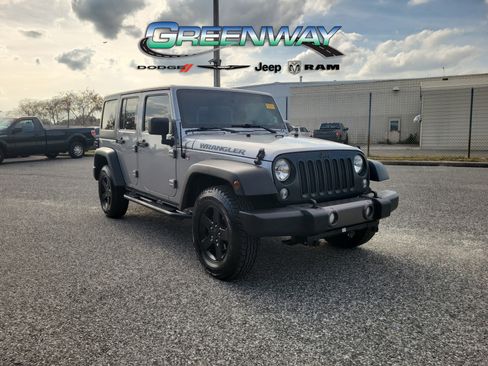 Used 2016 Jeep Wrangler Unlimited Sport image 1