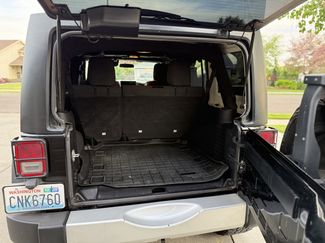 Used 2012 Jeep Wrangler Unlimited Sport w/ Black Appearance Group AWD/4WD video 1