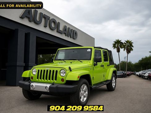 Used 2013 Jeep Wrangler Unlimited Sahara w/ Dual Top Group AWD/4WD image 1