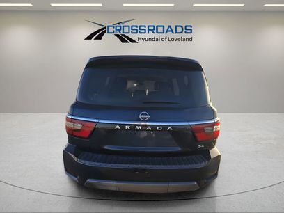 Used 2021 Nissan Armada SL w/ Captain's Chairs Package