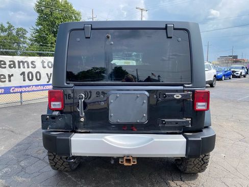 Used 2013 Jeep Wrangler Unlimited Sahara w/ Dual Top Group AWD/4WD image 3