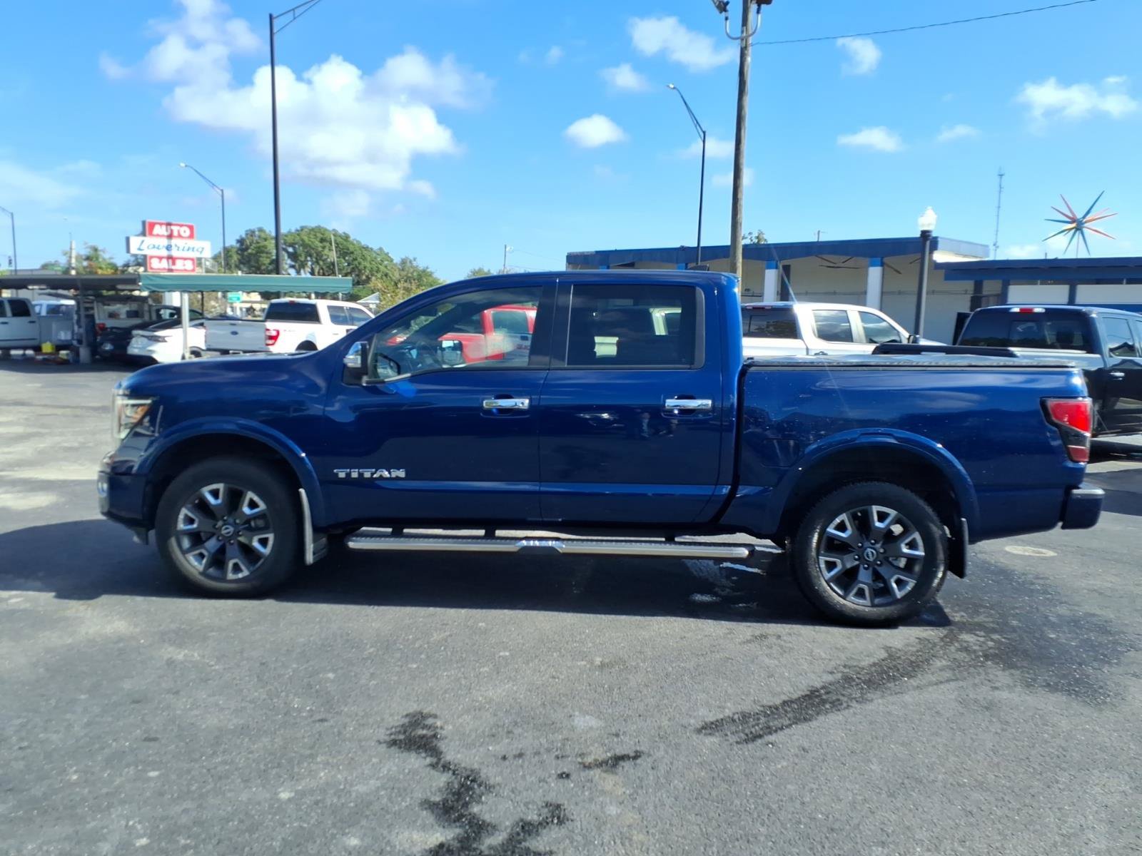 Used 2023 Nissan Titan Platinum Reserve w/ Off Road Protection Package AWD/4WD image 1
