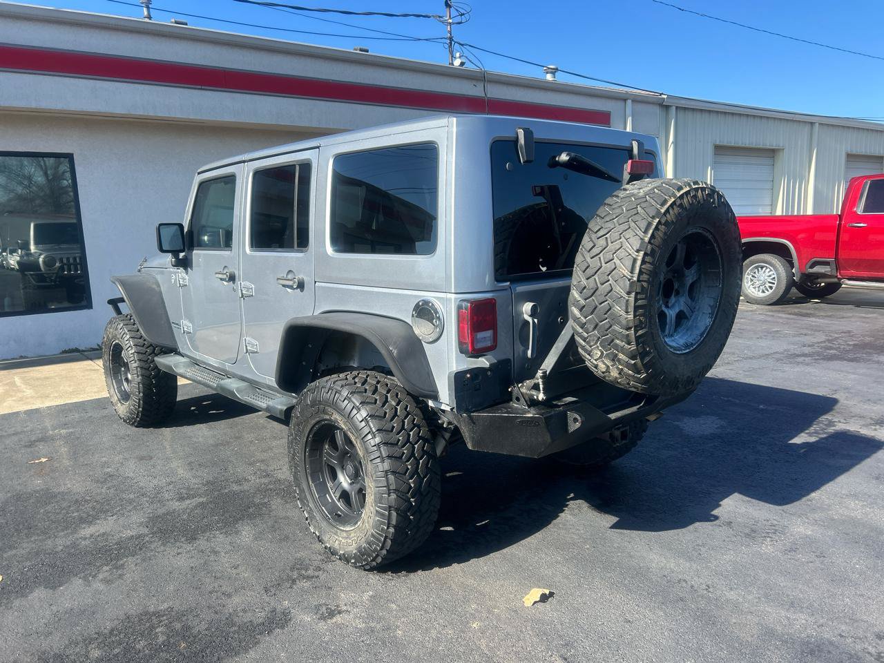 Used 2013 Jeep Wrangler Unlimited Sahara w/ Dual Top Group AWD/4WD image 6