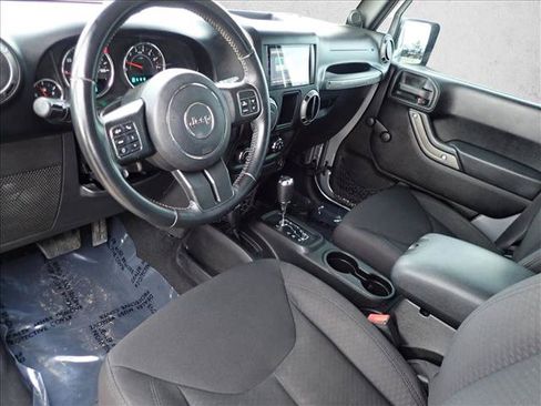 Used 2013 Jeep Wrangler Unlimited Sport w/ Mopar Black Appearance Group AWD/4WD image 10