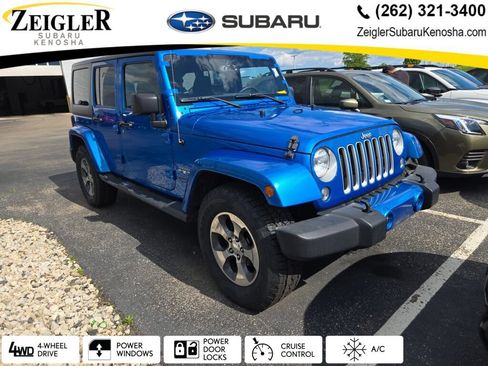 Used 2016 Jeep Wrangler Unlimited Sahara w/ Trailer Tow Group AWD/4WD image 1
