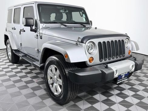 Used 2013 Jeep Wrangler Unlimited Sahara w/ Dual Top Group AWD/4WD image 29