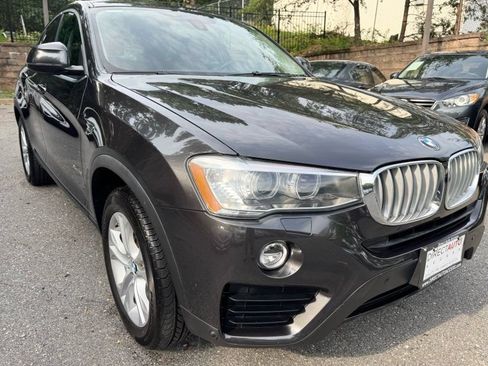 Used 2016 BMW X4 xDrive28i AWD/4WD image 1