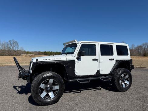 Used 2014 Jeep Wrangler Unlimited Rubicon w/ Connectivity Group AWD/4WD image 1