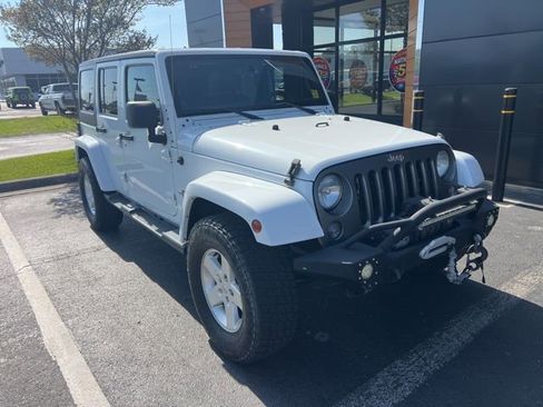 Used 2014 Jeep Wrangler Unlimited Sport image 1