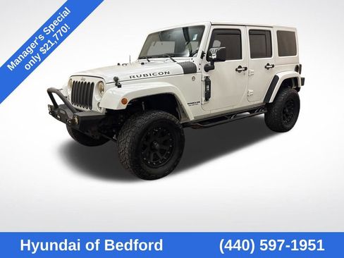 Used 2015 Jeep Wrangler Unlimited Rubicon w/ Dual Top Group image 1