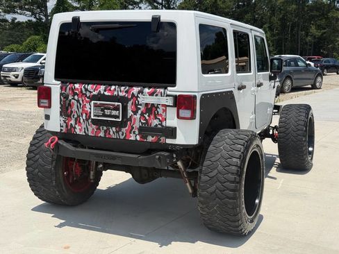 Used 2015 Jeep Wrangler Unlimited Rubicon w/ Dual Top Group AWD/4WD image 8