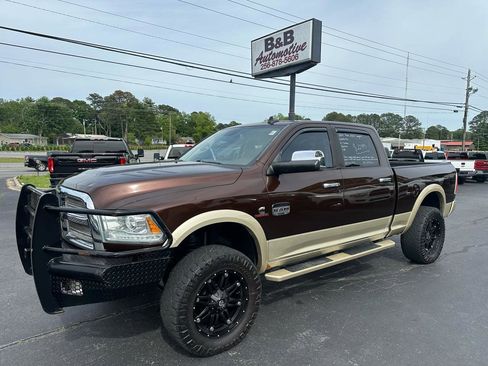 Used 2014 RAM 3500 Laramie Longhorn AWD/4WD image 1