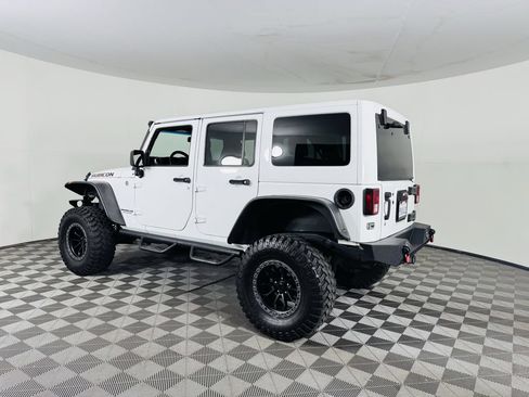 Used 2015 Jeep Wrangler Unlimited Rubicon w/ Dual Top Group AWD/4WD image 19