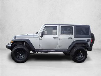 Used 2013 Jeep Wrangler Unlimited Sport w/ Mopar Black Appearance Group AWD/4WD video 2
