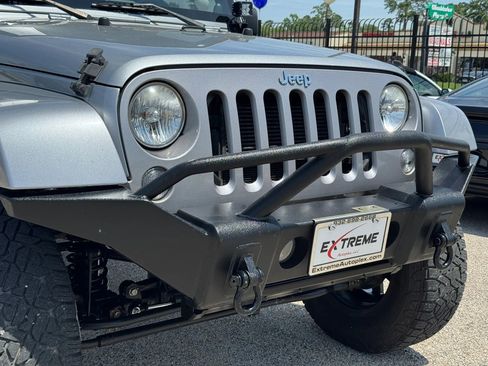 Used 2014 Jeep Wrangler Unlimited Sahara w/ Max Tow Package AWD/4WD image 12