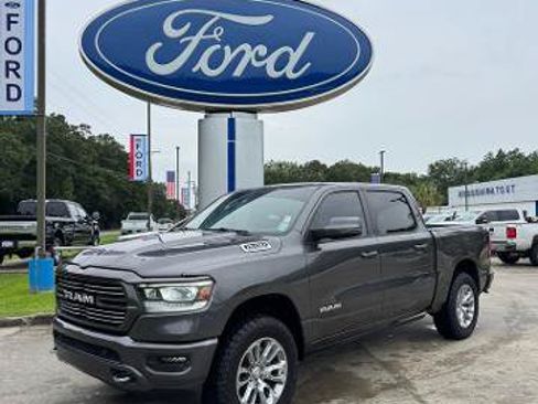 Used 2024 RAM 1500 Laramie AWD/4WD image 1