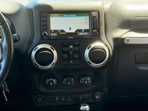Used 2016 Jeep Wrangler Unlimited Sahara w/ Dual Top Group AWD/4WD image 12