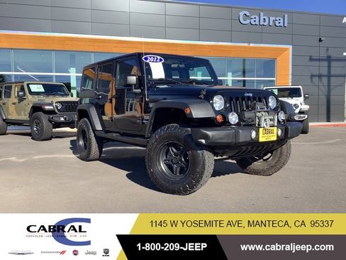 Used 2012 Jeep Wrangler Unlimited Sport image 1