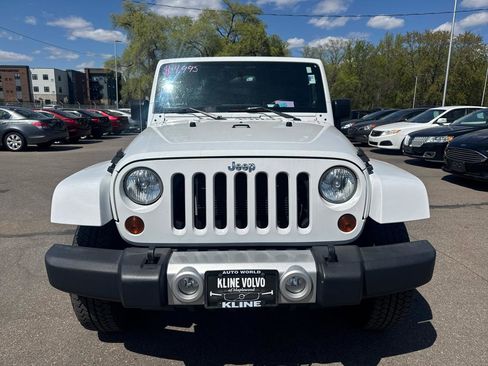 Used 2012 Jeep Wrangler Unlimited Sahara w/ Dual Top Group AWD/4WD image 2
