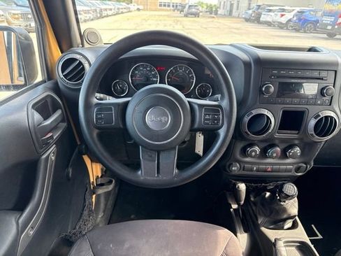 Used 2013 Jeep Wrangler Unlimited Sport w/ Mopar Black Appearance Group AWD/4WD image 19