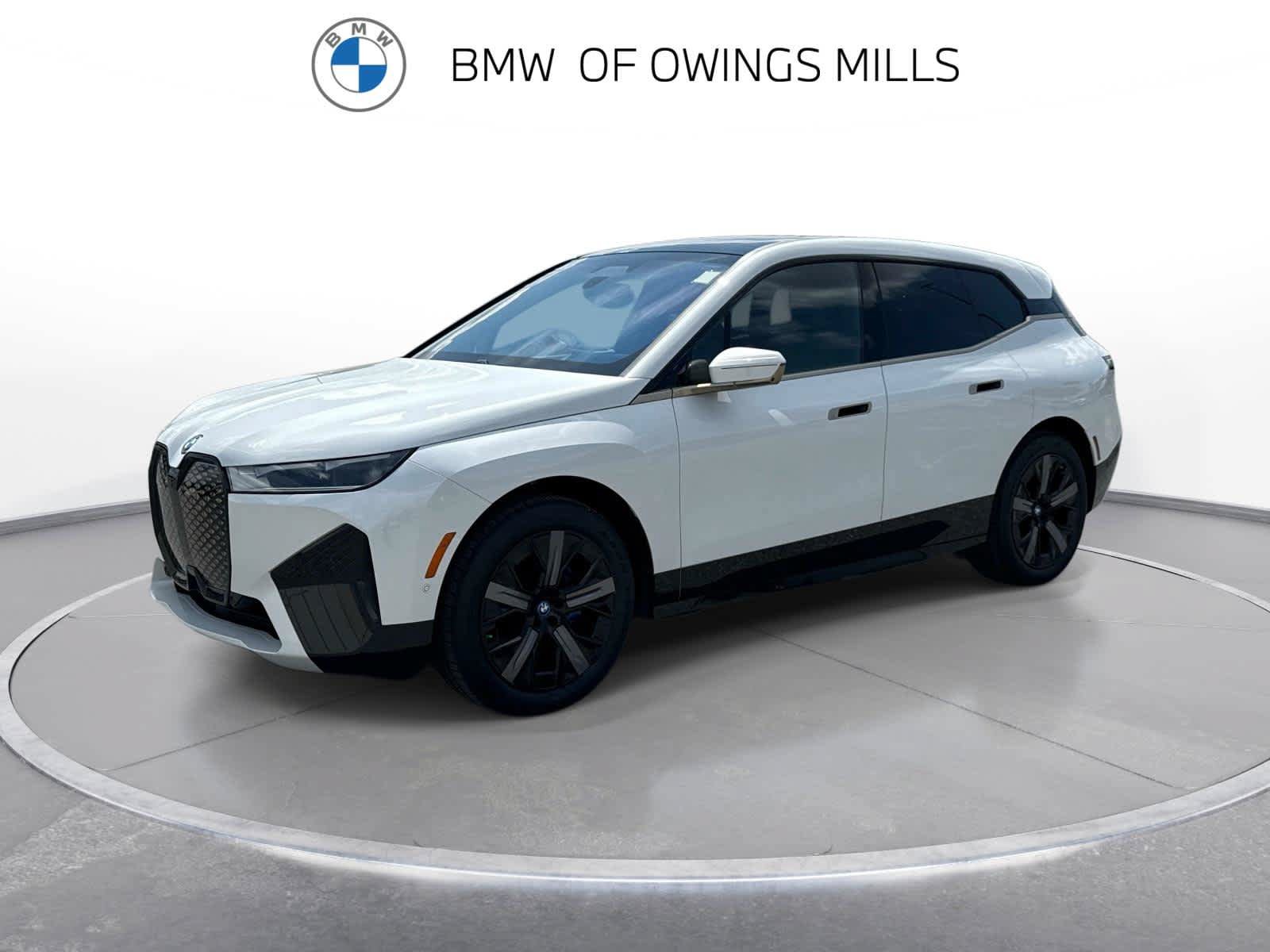 Used 2024 BMW iX xDrive50 w/ Premium Package AWD/4WD image 1