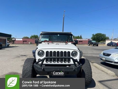 Used 2012 Jeep Wrangler Unlimited Sahara w/ Connectivity Group AWD/4WD image 1