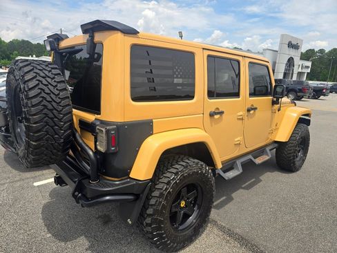 Used 2014 Jeep Wrangler Unlimited Rubicon w/ Dual Top Group AWD/4WD image 2